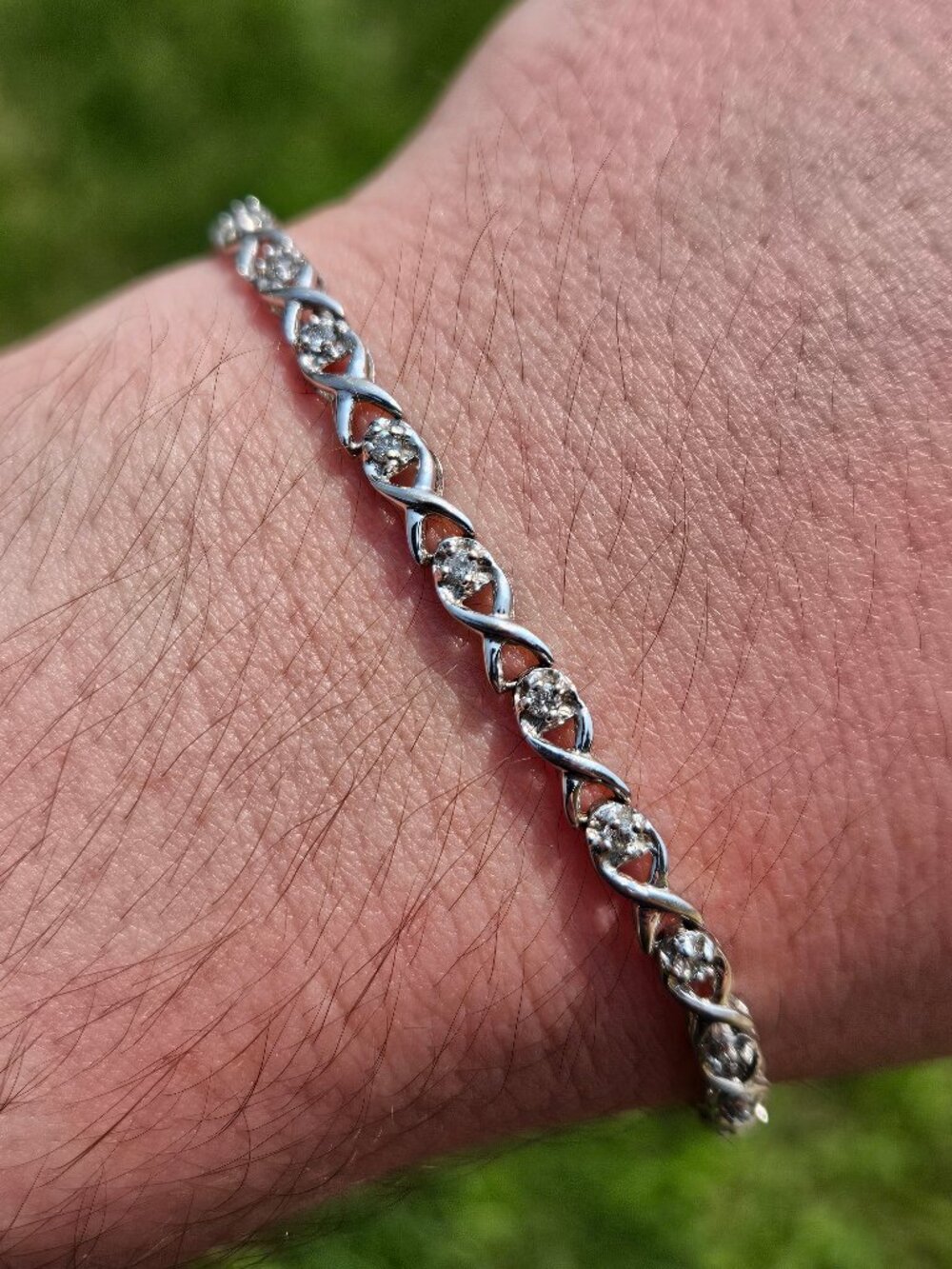 10K White Gold Diamond Infinity Link Tennis Bracelet 7 inches 4mm